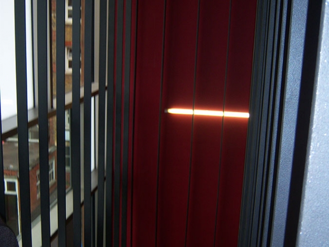 Stairs suspended through 4 floors from the top of the building