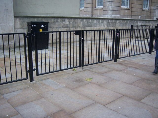 Pedestrian security control railings and gate at entrance to Downing Street, London